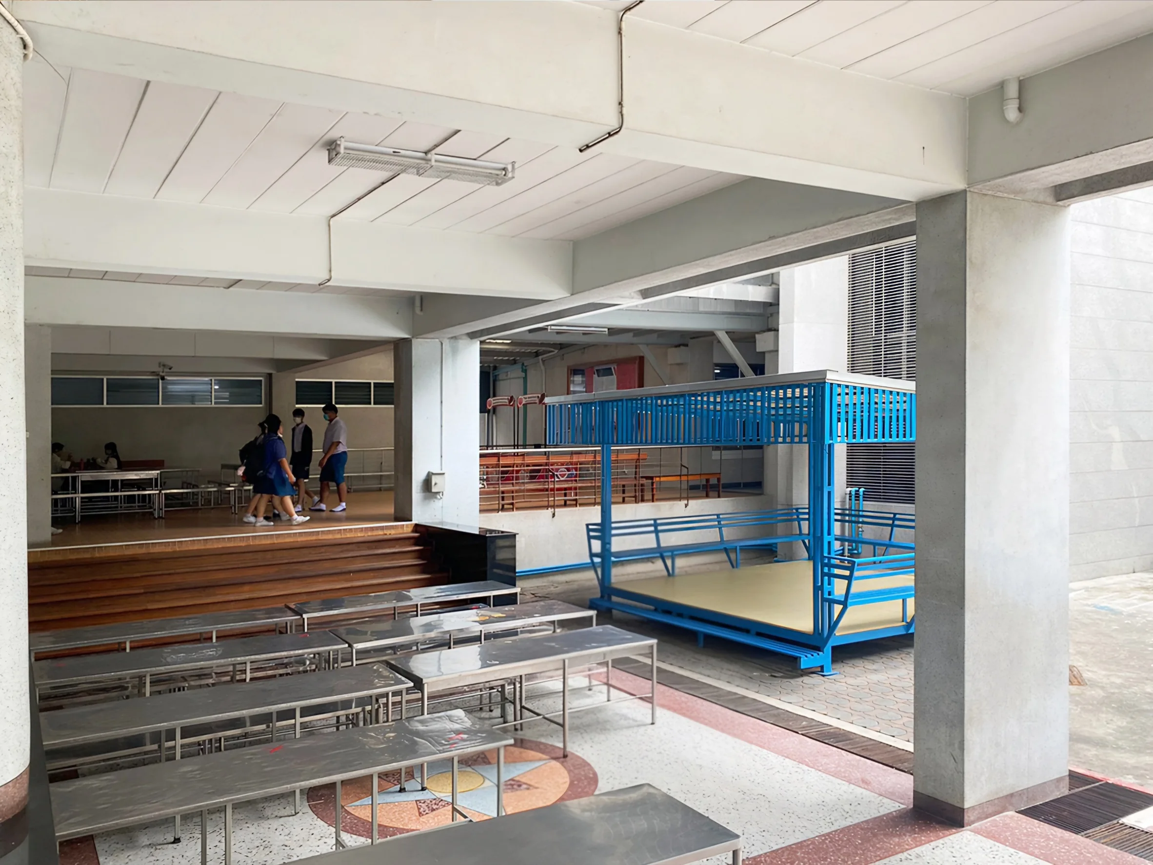 Columns, beams, changes in level and existing furniture reveal the accumulated conditions of the site.